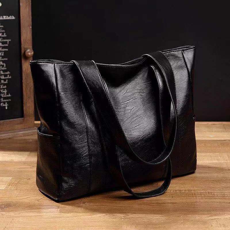 M306Real leather handbag