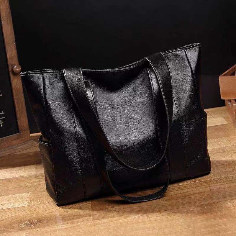 M306Real leather handbag