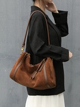 M145 Large boston handbag in suede